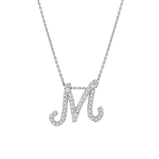 A necklace featuring the Roberto Coin Tiny Treasures 18K White Gold Cursive Initial Pendant with a diamond-encrusted letter "M" design on a silver chain.