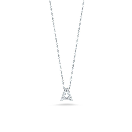 A delicate silver chain necklace showcasing the Roberto Coin Tiny Treasures 18K White Gold Diamond Initial Pendant, crafted in white gold and encrusted with small diamonds against a white background.