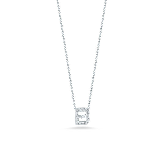 The Roberto Coin Tiny Treasures necklace, from the esteemed Roberto Coin brand, boasts an 18K White Gold chain and features a pendant shaped like the letter "B," adorned with shimmering diamonds. Set against a plain white background, this elegant piece is beautifully showcased.