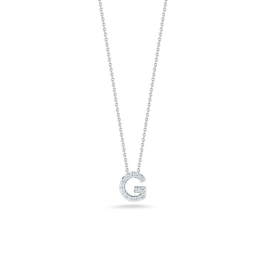 Explore the Roberto Coin Tiny Treasures 18K White Gold Diamond Initial Necklace Pendant: an elegant silver chain necklace adorned with a shimmering, diamond-accented letter "G." Expertly crafted with 18 Karat white gold, this stunning piece captures the sophistication of Roberto Coin and is elegantly presented against a simple white background.