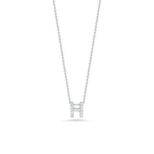 The Roberto Coin Tiny Treasures Love Letter 18K White Gold Diamond Initial Necklace Pendant features a delicate silver necklace with an 18 Karat white gold chain and a sparkling, diamond-encrusted initial "H" pendant. The white background accentuates the elegance and simplicity of this exquisite piece by Roberto Coin.