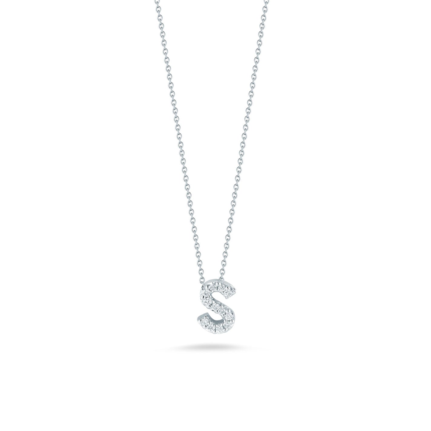 The Roberto Coin Tiny Treasures Love Letter 18K White Gold Diamond Initial Necklace Pendant features an 'S' initial adorned with 0.05 CTW diamonds, elegantly displayed on a delicate chain against a white background.