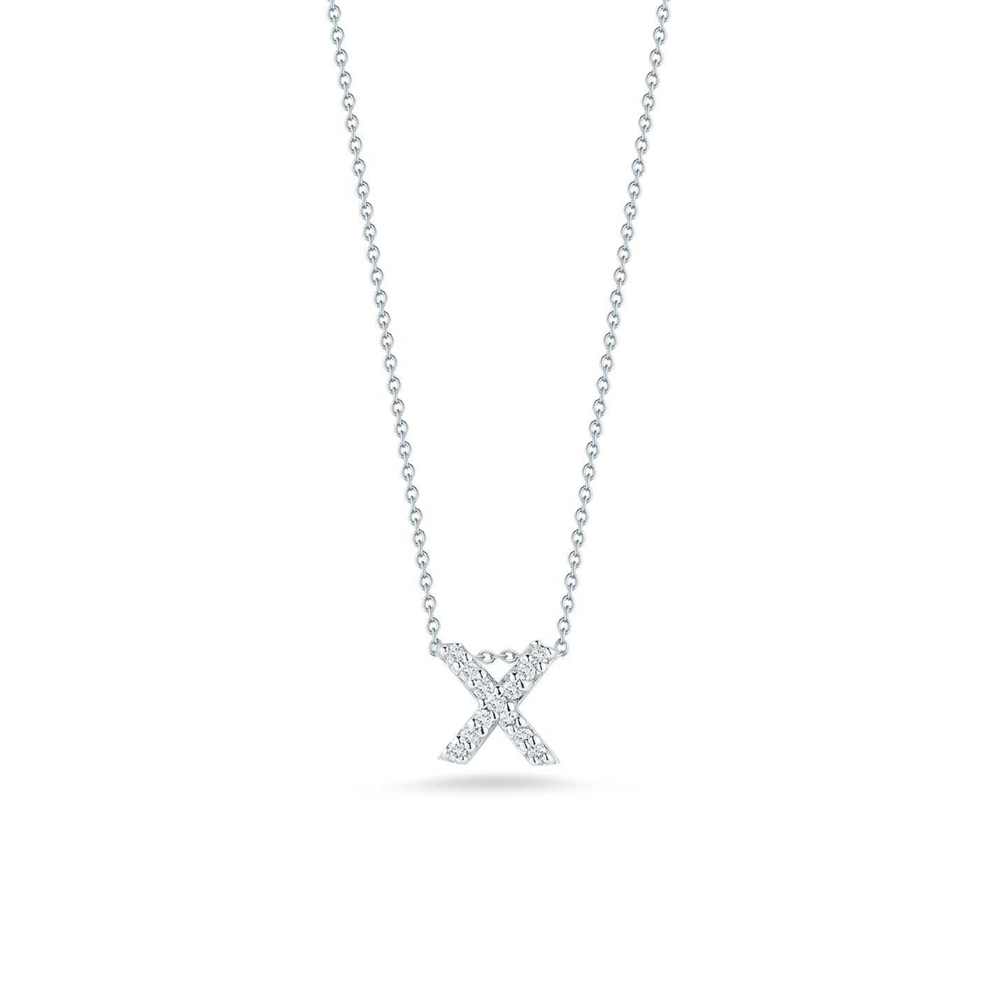 This exquisite necklace, part of Roberto Coin's Tiny Treasures collection, showcases the Love Letter 18K White Gold Diamond Initial Pendant in the shape of an "X." The pendant is adorned with sparkling diamonds and gracefully hangs from a delicate chain against a plain white background.