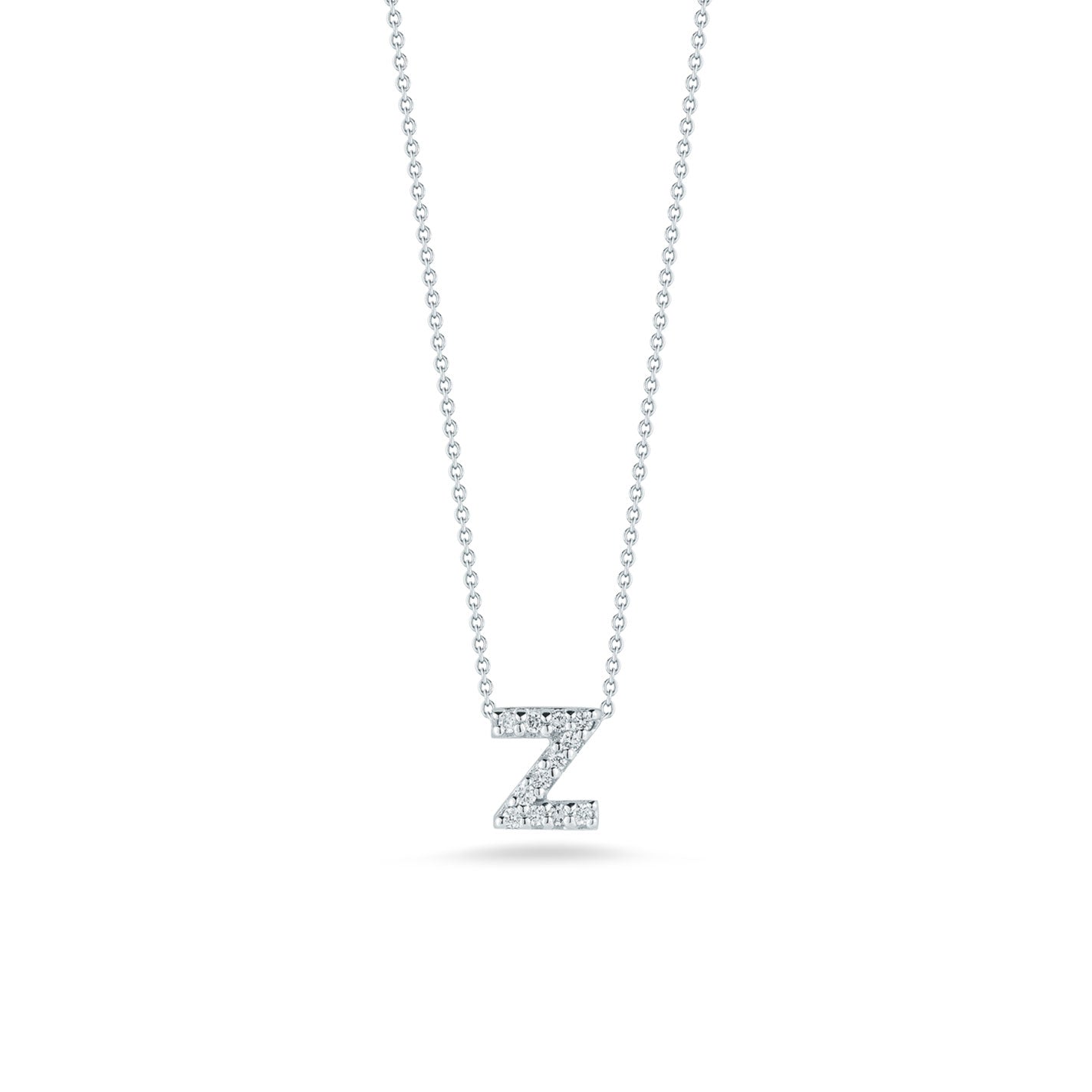 The Roberto Coin Tiny Treasures Love Letter 18K White Gold Diamond Initial Necklace Pendant features a delicate initial 'Z' crafted from 18K white gold, embellished with small, sparkling diamonds against a plain white background.