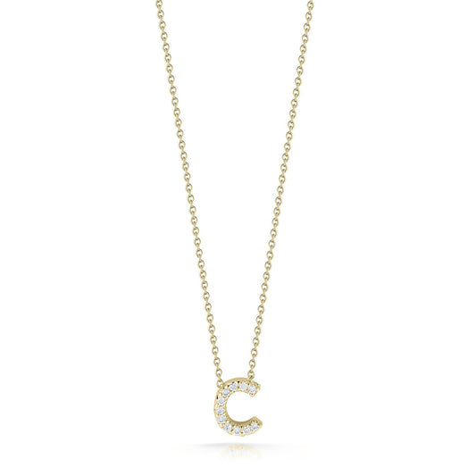 The Roberto Coin Tiny Treasures Love Letter 18K Yellow Gold Diamond Initial Necklace Pendant features a delicate chain and an initial 'C' pendant adorned with round diamonds, set beautifully against a white background to enhance its elegance.