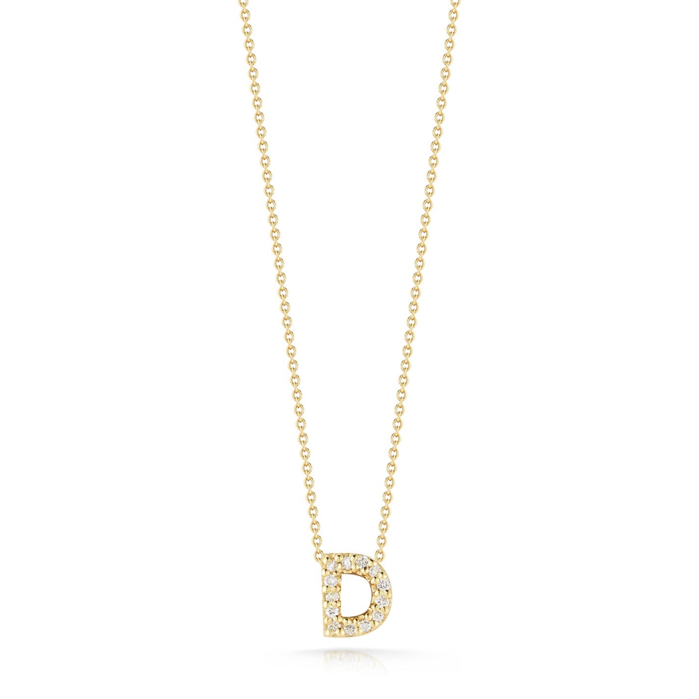 The Roberto Coin Tiny Treasures Love Letter 18K Yellow Gold Diamond Initial Necklace Pendant is an exquisite piece from the renowned brand Roberto Coin. It features a graceful gold necklace with a "D" -shaped pendant, embellished with delicate, sparkling diamonds. The slender chain beautifully enhances the shimmering appeal of this initial pendant.