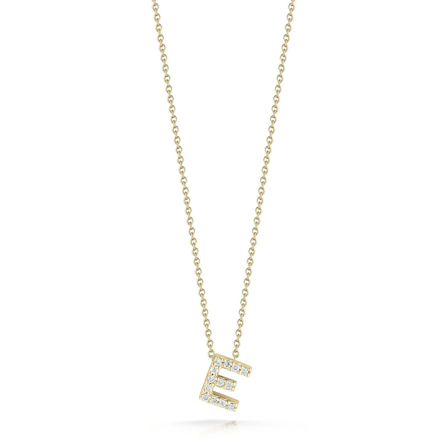 The Roberto Coin Tiny Treasures Love Letter 18K Yellow Gold Diamond Initial Necklace Pendant features a shimmering letter "E" pendant embellished with small diamonds, elegantly displayed on a white background.