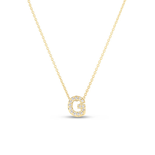 The Roberto Coin Tiny Treasures Love Letter 18K Yellow Gold Diamond Initial Necklace Pendant elegantly displays a pendant in the shape of the letter 'G,' adorned with sparkling diamonds. This exquisite piece by Roberto Coin showcases its total carat weight beautifully and is artfully presented against a plain white background.