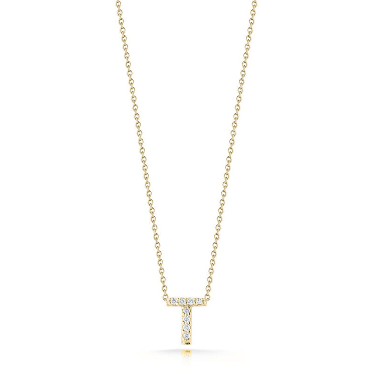 The Roberto Coin Tiny Treasures Love Letter necklace features an 18K yellow gold pendant adorned with a sparkling "T" initial, beautifully set with small round diamonds.