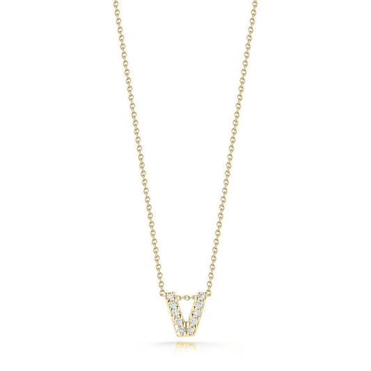 The Roberto Coin Tiny Treasures Love Letter necklace features an 18 Karat yellow gold initial 'V' pendant adorned with sparkling diamonds, centrally displayed on a delicate gold chain.