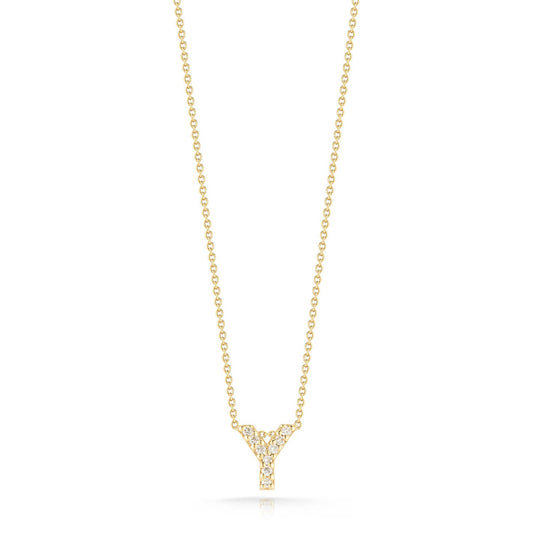 The Roberto Coin Tiny Treasures Love Letter 18K Yellow Gold Diamond Initial Necklace Pendant features a "Y" initial embellished with small round diamonds, gracefully suspended from a fine chain.