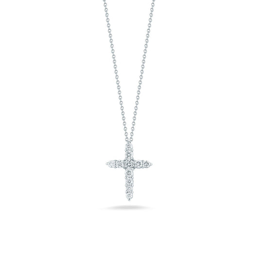 Introducing the Roberto Coin Tiny Treasures 18K White Gold Diamond Cross Necklace Pendant, an exquisite creation by Roberto Coin. This elegant necklace, crafted from 18K white gold and featuring a dazzling diamond cross pendant, is beautifully highlighted against a white background.