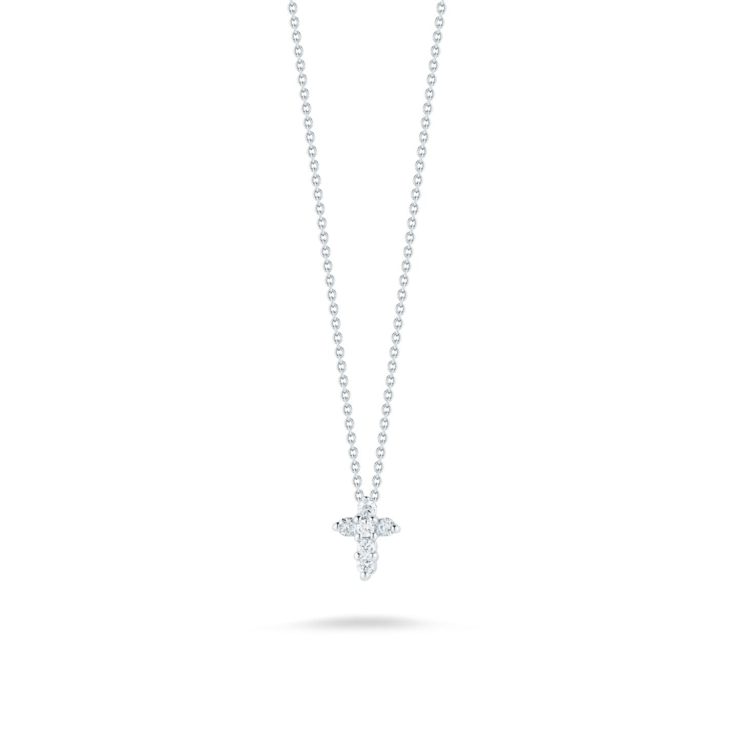 The Roberto Coin Tiny Treasures 18K White Gold Diamond Cross Necklace Pendant showcases a delicate design with its thin white gold chain and shimmering diamonds, elegantly positioned against a simple white background.