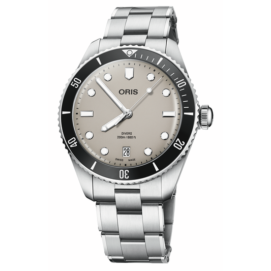 ORIS Divers Date Calibre 733-1 Automatic Winding 39mm Watch featuring a beige dial, black ceramic bezel, and a date window at the six o’clock position.