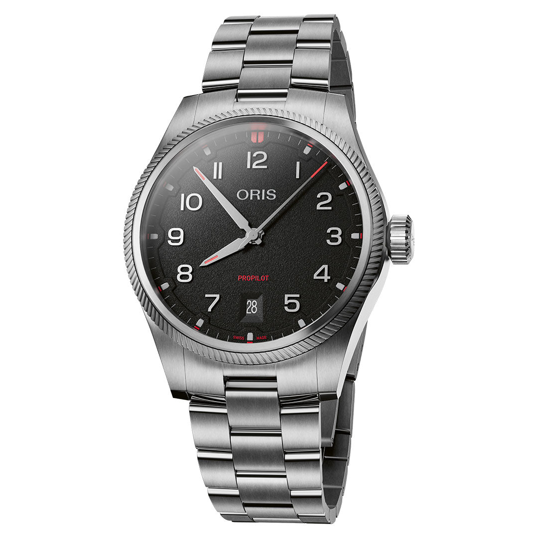 The ORIS Pro Pilot Date Automatic 41mm features a stainless steel case, black textured dial with silver hour markers, red accents, date window at 6 o’clock, fluted bezel, three hands, Calibre 733 movement & metal link bracelet.