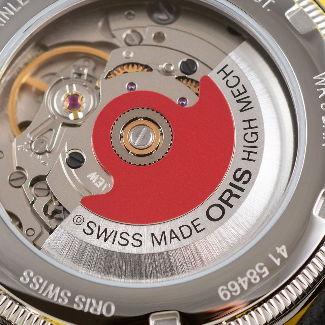 Close-up of the ORIS Big Crown Pointer Date Bullseye Automatic 38mm Watch movement, showcasing visible gears and a red rotor marked "SWISS MADE ORIS HIGH MECH," reflecting the detailed craftsmanship of the collection.
