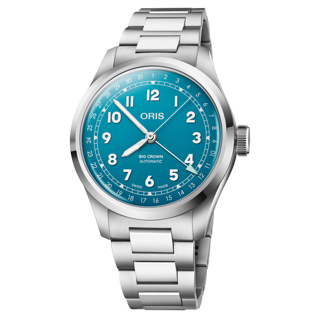 The ORIS Big Crown Pointer Date Calibre 754-1 is a 40mm stainless steel watch with a turquoise blue dial, white numerals, silver hands, metal bracelet, automatic movement, and a Swiss-made 1–31 date scale.