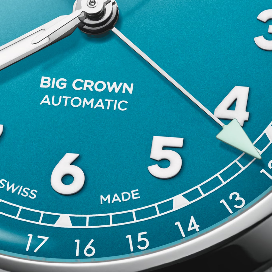 Close-up of the Oris Big Crown Pointer Date Calibre 754-1 40mm dial, displaying bold white numerals, minute markers, a pointer date hand at 4, and "BIG CROWN AUTOMATIC," with a silver case housing Swiss automatic movement.