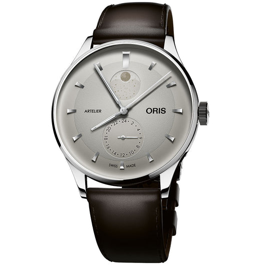 The ORIS Artelier Complication Calibre 782 Automatic 39.5mm Watch features a silver case, brown leather strap, moon phase display at 12 o'clock, 24-hour subdial, and silver hour markers and hands.