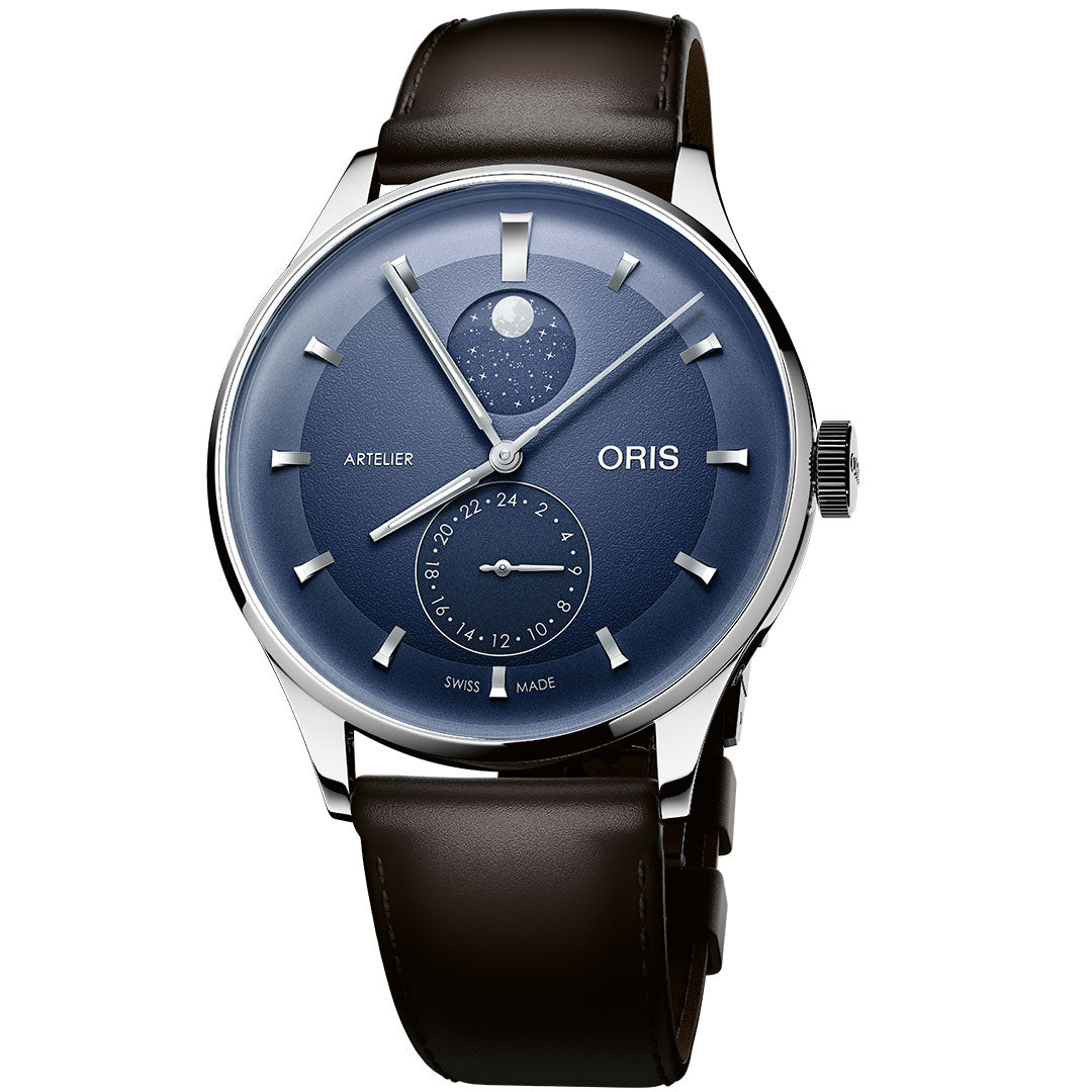 The ORIS Artelier Complication Calibre 782 Automatic 39.5mm Watch features a blue dial, moon phase display, date subdial, silver hour markers, and a brown leather strap for a stylish look.