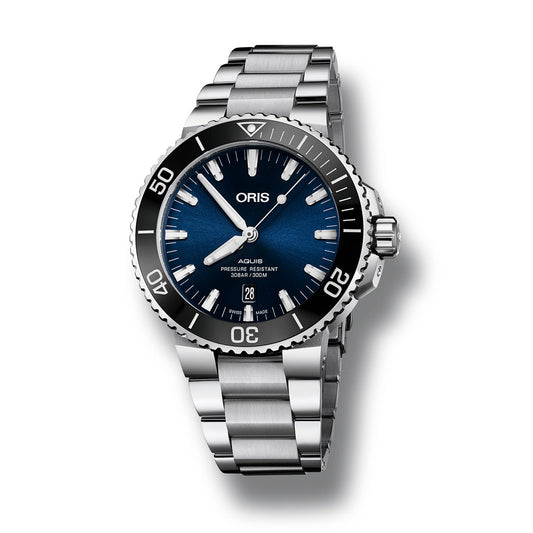 The ORIS Oris Aquis Date Automatic Winding 43.5mm Watch features a dark blue dial with silver hour markers and a black rotating bezel. It has a stainless steel case, prominently displays the ORIS brand name, includes a date window at the 6 o'clock position, and comes with a polished metallic bracelet.