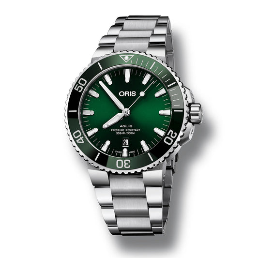 The Oris Aquis Date Automatic Winding 43.5mm Watch features a striking green dial and bezel adorned with minute markings. Its stainless steel case prominently displays the "ORIS" and "Aquis" branding, complemented by numeric markers. The watch includes a date window positioned above the 6 o'clock mark, adding to the sophistication of its metal bracelet.