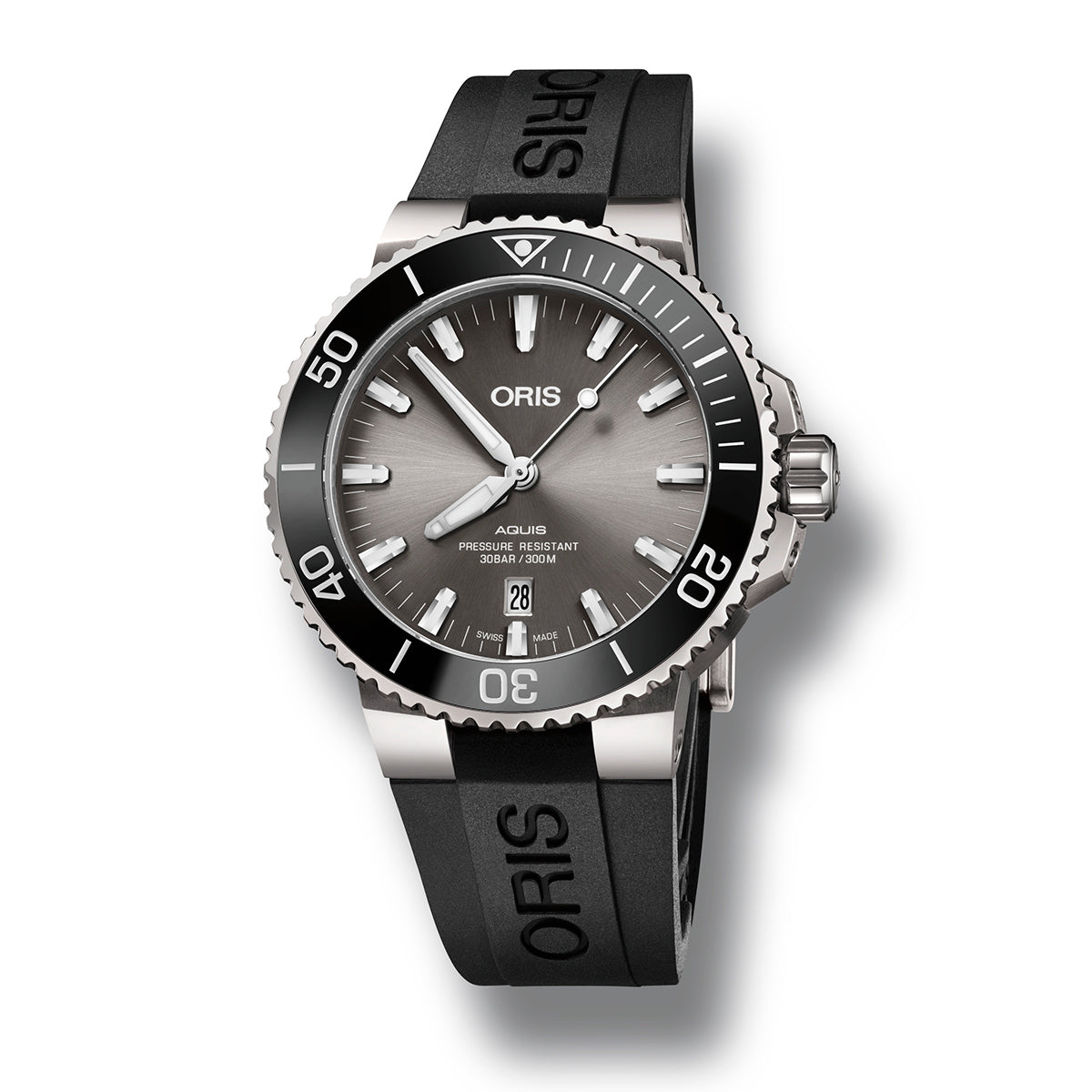 The Oris Aquis Titanium Date Automatic Winding 43.5mm Watch by ORIS highlights a modern silver and black design with a titanium case and an elegant black rubber strap. It boasts a bold black bezel adorned with white markers, coupled with a gray dial featuring luminous indices, and includes a convenient date display at the 6 o'clock position.