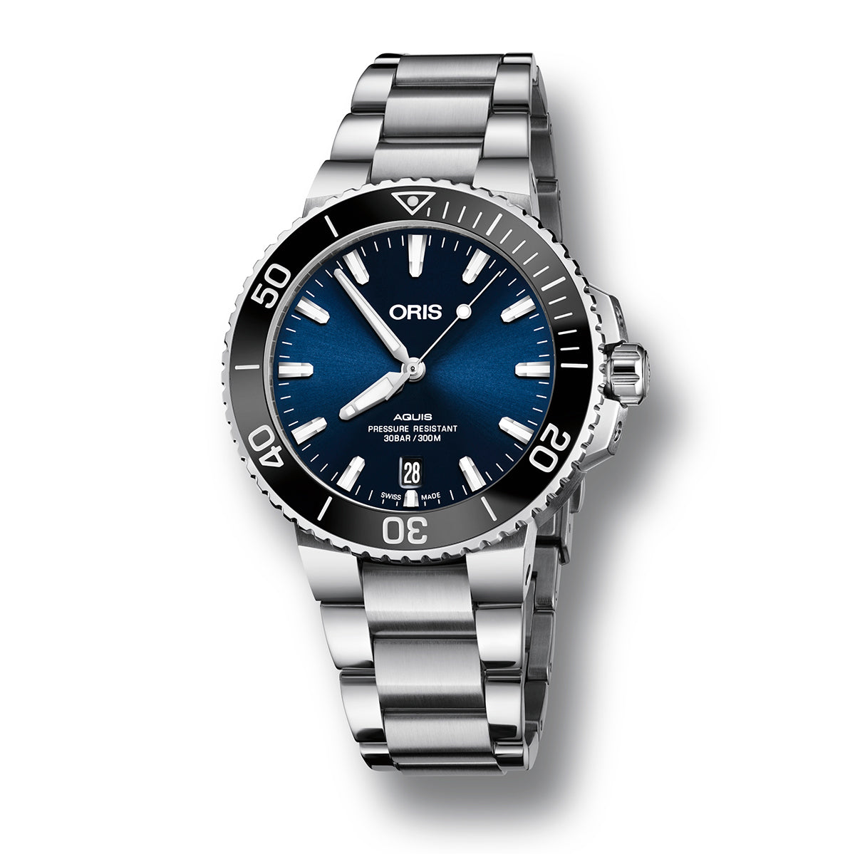 The ORIS Aquis Date Automatic Winding 39.5mm Watch is an impressive silver dive watch that showcases a dark blue dial and a stainless steel case with a bracelet. Its diving bezel is detailed with numerals and a top triangle, while the dial features luminescent markers, hands, and a date window at the 6 o'clock position.