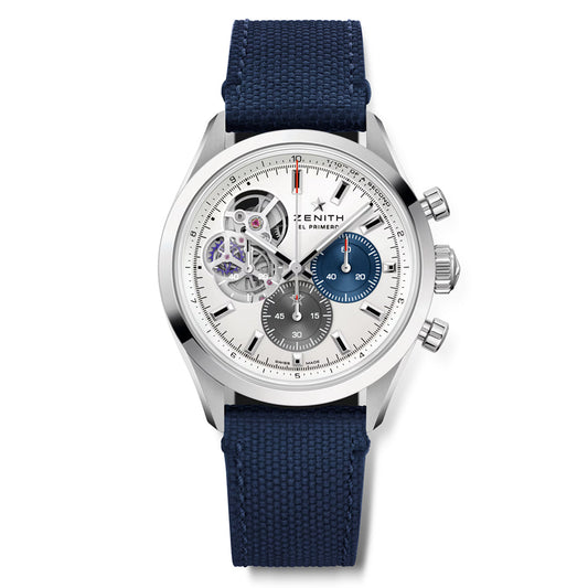 The ZENITH Chronomaster Open El Primero 3604 39.5mm Watch by Zenith is a silver chronograph with the El Primero movement, featuring a blue fabric strap, gray 60-second, blue 30-minute, and silver 12-hour sub-dials with exposed mechanics and silver markers and hands.