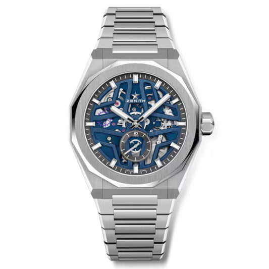 The ZENITH Defy Skyline Skeleton El Primero 3620 SK Automatic 41mm watch features a silver wristwatch with a stainless steel band, intricate blue skeleton dial showcasing its El Primero movement, and an elegant octagonal bezel. The Zenith brand is prominently displayed.