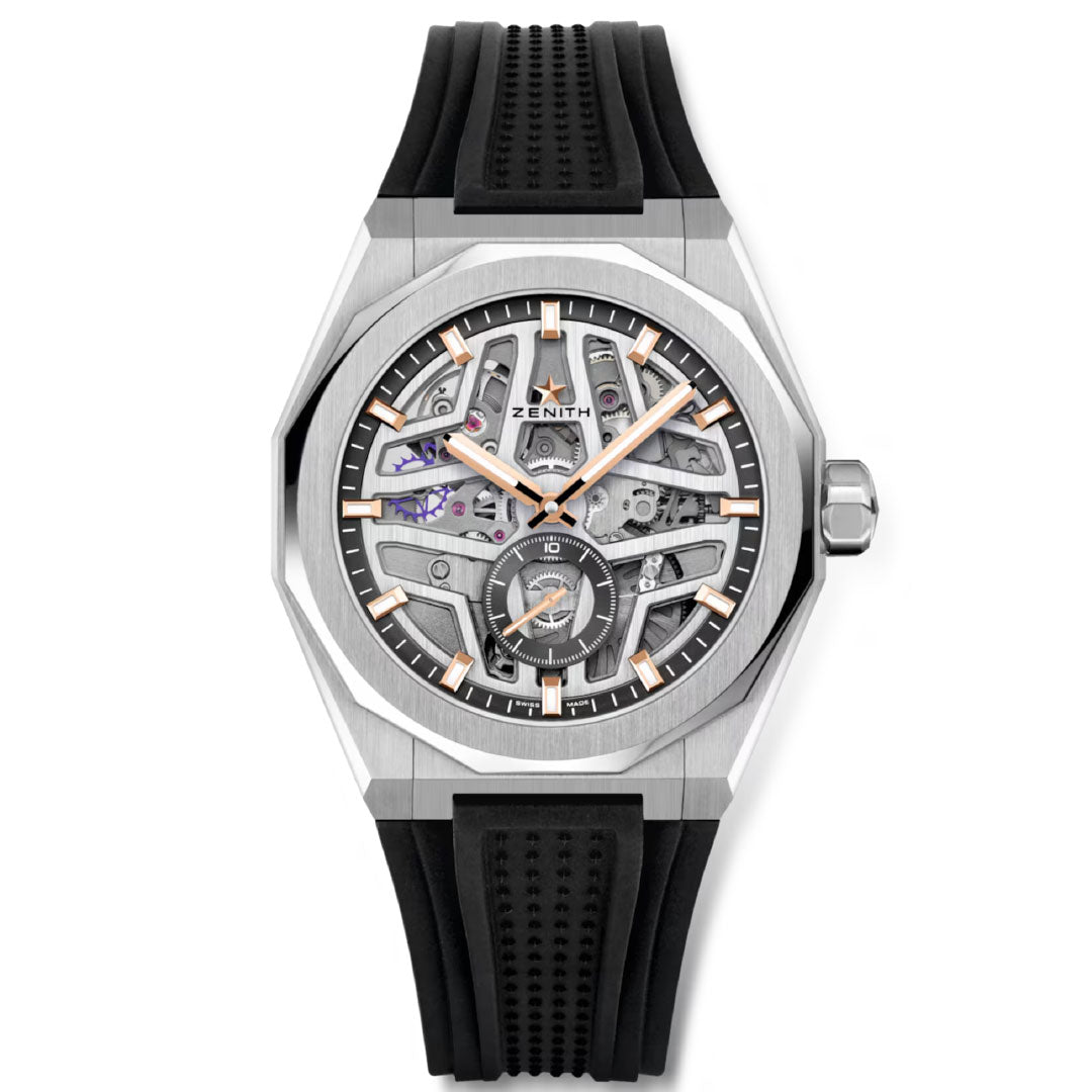 The ZENITH Defy Skyline Skeleton Boutique Edition 41mm watch features the El Primero 3620 SK automatic movement, a geometric silver case with rose gold accents, black rubber strap, steel bracelet, and “Zenith” on the dial.