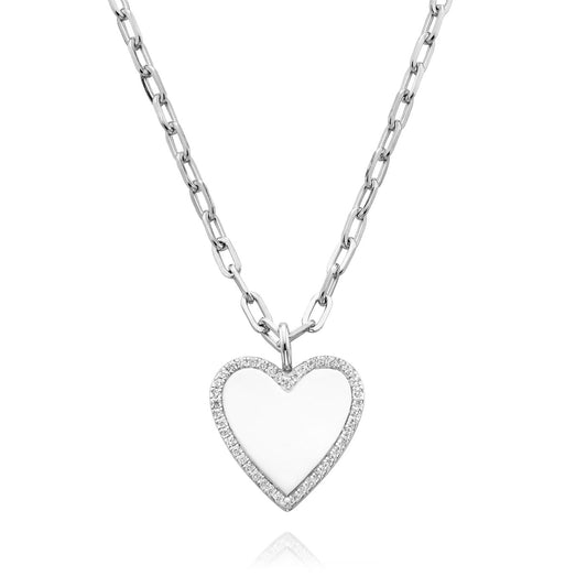 The Miss Mimi by Yael sterling silver paperclip chain necklace features an 18" length and a heart-shaped contour pendant, delicately outlined with small sparkling gems. The design's uniformly sized links contribute to its elegant and minimalistic appearance, complemented by rhodium bonding for lasting shine.