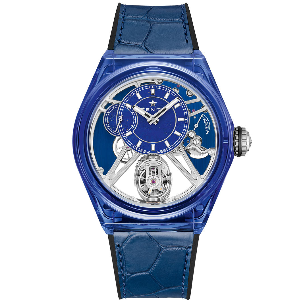 The ZENITH Defy Zero G El Primero 8812 is a limited edition (10 pieces) luxury blue watch featuring a skeleton dial, exposed tourbillon, skeletonized movement, blue alligator strap, silver accents, and the Zenith name with gold star on its face.