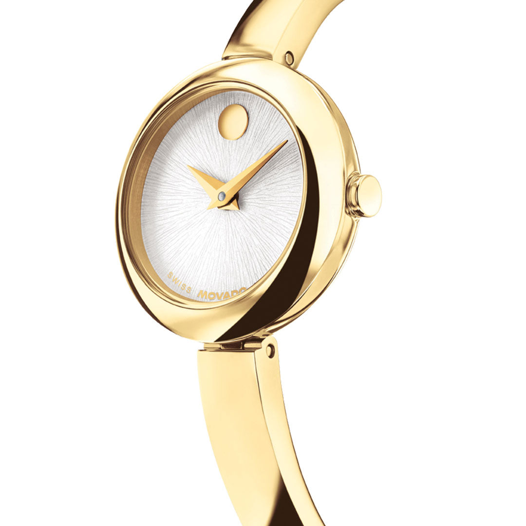 The Movado Museum Bangle Quartz 21.5mm Watch by Movado features a minimalist white dial with a signature gold dot at 12, polished gold band, and sleek gold hands for a refined, jewelry-inspired style.