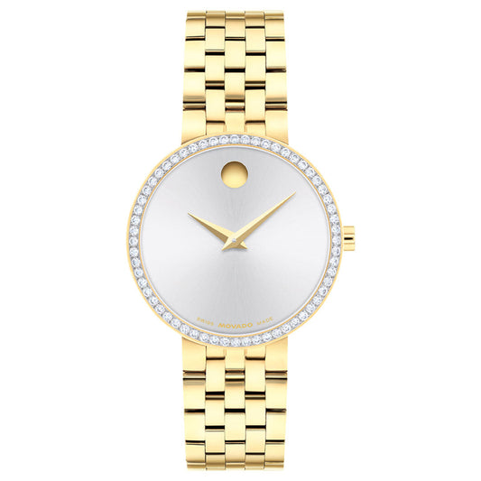 The Movado Museum Classic Quartz 29.5mm Watch by Movado features a round silver white sunray dial with a lab-grown diamond bezel, gold hour and minute hands, a minimal design free of numbers or markers, and a linked gold bracelet—an elegant wristwatch inspired by the iconic Museum Classic.