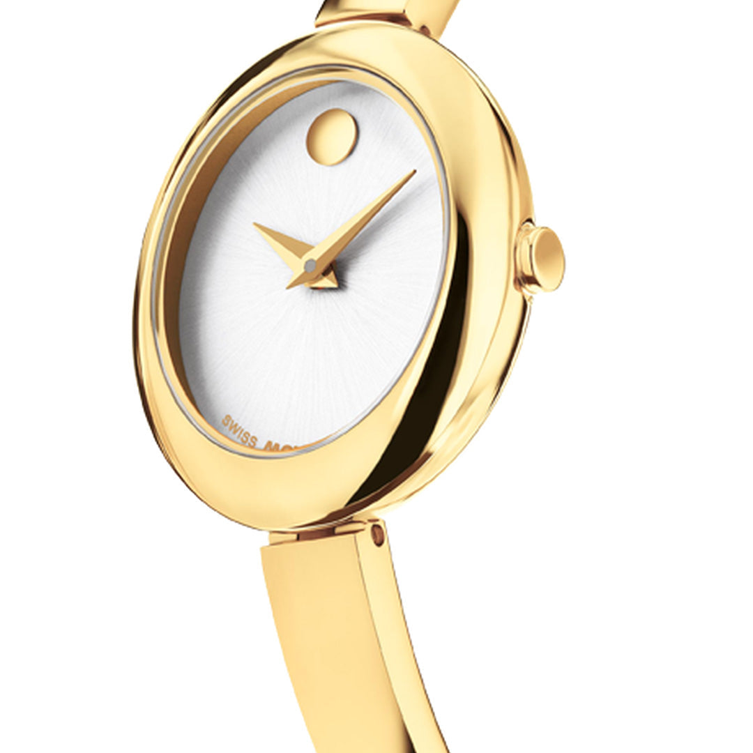 The Movado Museum Bangle Quartz 21.5mm x 25.5mm Watch by Movado is a jewelry-inspired timepiece featuring a sleek, modern oval design displayed at an angle, with a white dial, gold hands, minimal markings, and a polished gold-tone finish.
