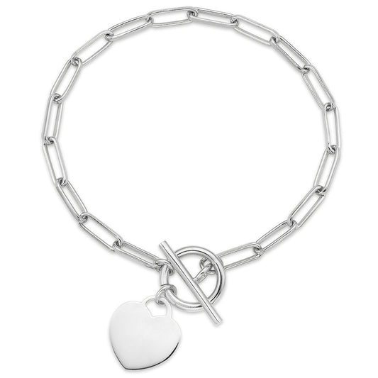Introducing the Miss Mimi Toggle Clasp Sterling Silver Chain Bracelet with Heart Pendant by Miss Mimi by Yael. This bracelet showcases a heart-shaped pendant and a toggle clasp on its 7.5-inch sterling silver chain, which is designed with elongated links for a sleek and modern look, all beautifully presented against a plain white background.