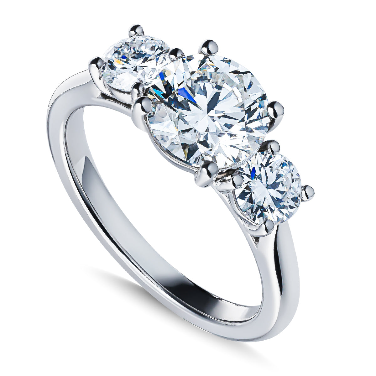 The Raffi&Co.® Signature 14K White Gold Round Brilliant Three Stone Diamond Engagement Ring showcases an exquisite design with a prominent round diamond center stone, complemented by two smaller gems, all elegantly set in a sleek 14K white gold band.