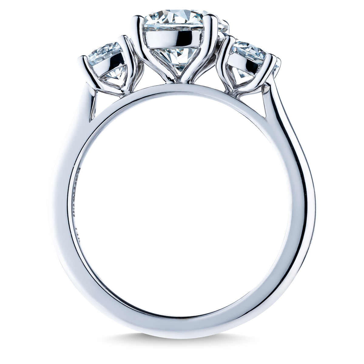 The Raffi&Co.® Signature 14K White Gold Round Brilliant Three Stone Diamond Engagement Ring showcases a central round-cut diamond, complemented by two smaller diamonds on each side, all set in a sleek 14K white gold band.