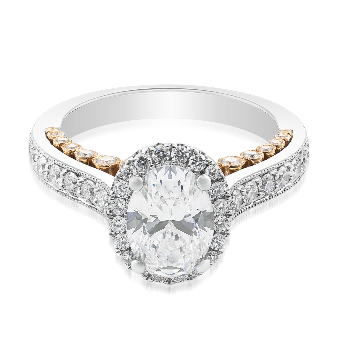 The Raffi&Co.® 18K Yellow and White Gold Oval Halo Diamond Engagement Ring showcases an elegant design with a GIA Certified, sizable oval-cut diamond at its center, encircled by a halo of smaller diamonds. It features accents of 18K yellow and white gold and additional embedded diamonds on the band, offering a sophisticated look.