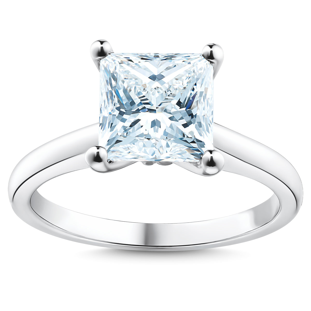 The Raffi&Co.® 18K White Gold Princess Solitaire Diamond Engagement Ring showcases a brilliant princess solitaire diamond, secured by four prongs on a sleek 18K white gold band. The clear diamond is expertly faceted to reflect light, producing a stunning and dazzling effect.