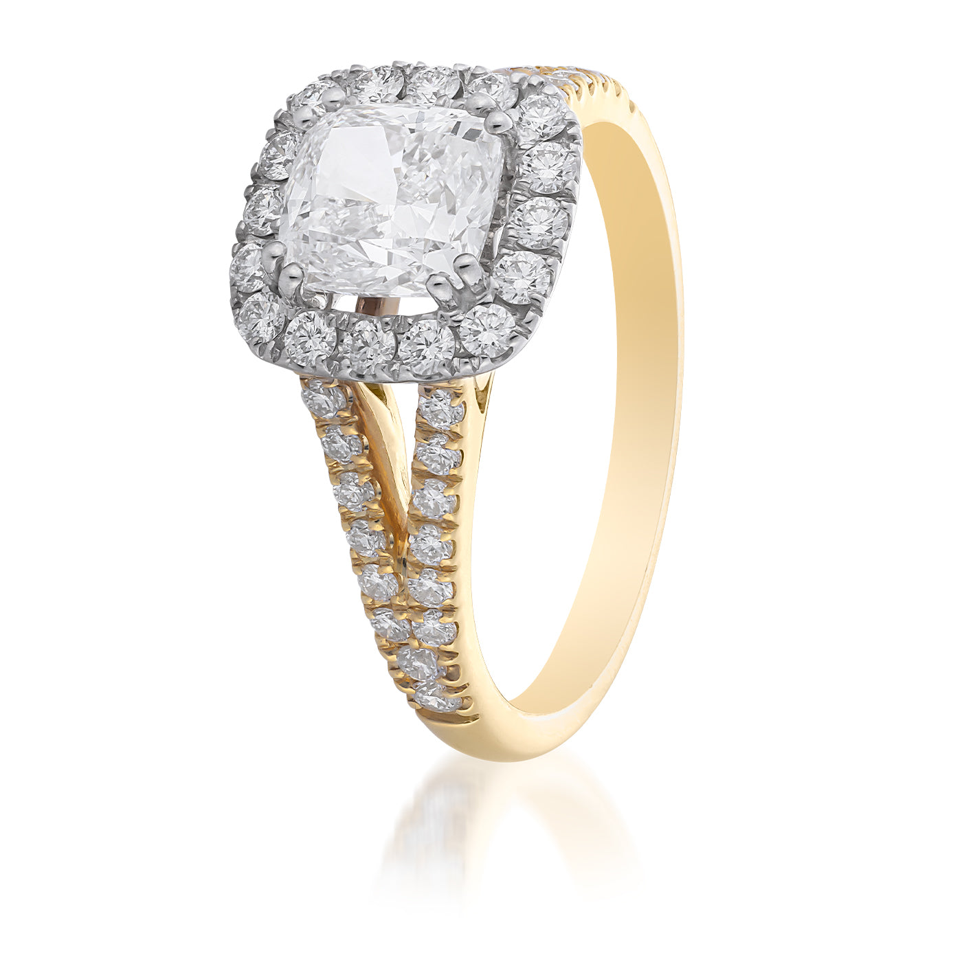 The Raffi&Co.® 18K Yellow And White Gold Cushion Halo Diamond Engagement Ring by Raffi&Co features a GIA certified cushion-cut diamond surrounded by a halo of small round diamonds. Its band gracefully splits into two, each side adorned with smaller diamonds, adding to its sparkle and sophistication.