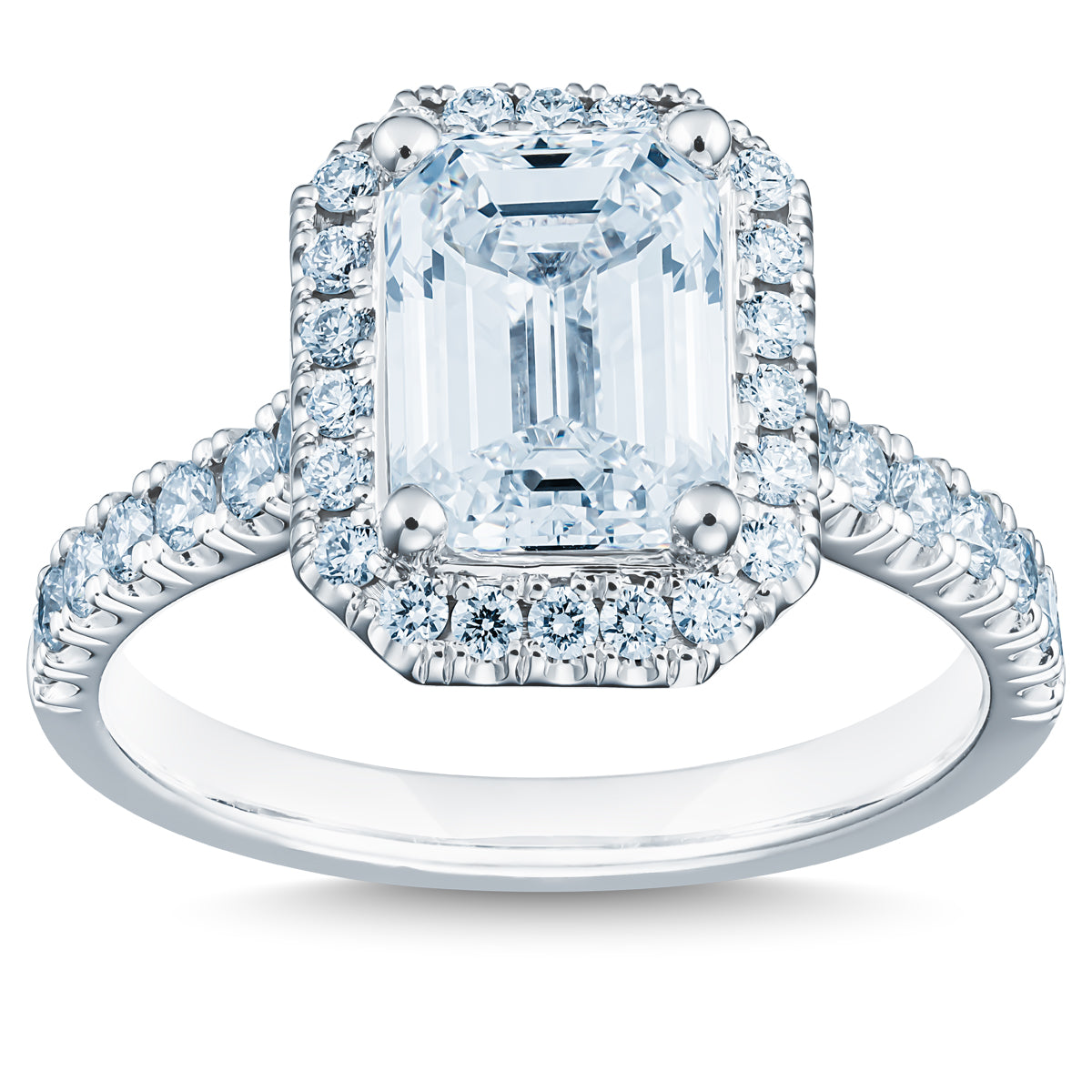 The Raffi&Co.® 14K White Gold Emerald Halo Diamond Engagement Ring features a striking emerald-cut diamond at its center, encircled by a halo of smaller round diamonds. The band, made of 14K white gold, is embellished with additional radiant diamonds and is GIA certified for outstanding quality and craftsmanship.