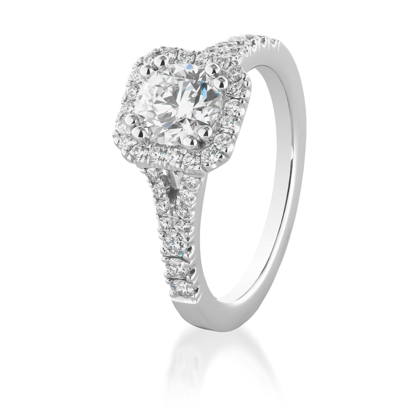 The Raffi&Co.® Signature 14K White Gold Round Brilliant Halo Diamond Engagement Ring showcases a stunning central diamond, beautifully set in a radiant halo setting. The band is elegantly embellished with small diamonds, amplifying its sparkle and sophistication, making it an ideal choice for those seeking timeless elegance.