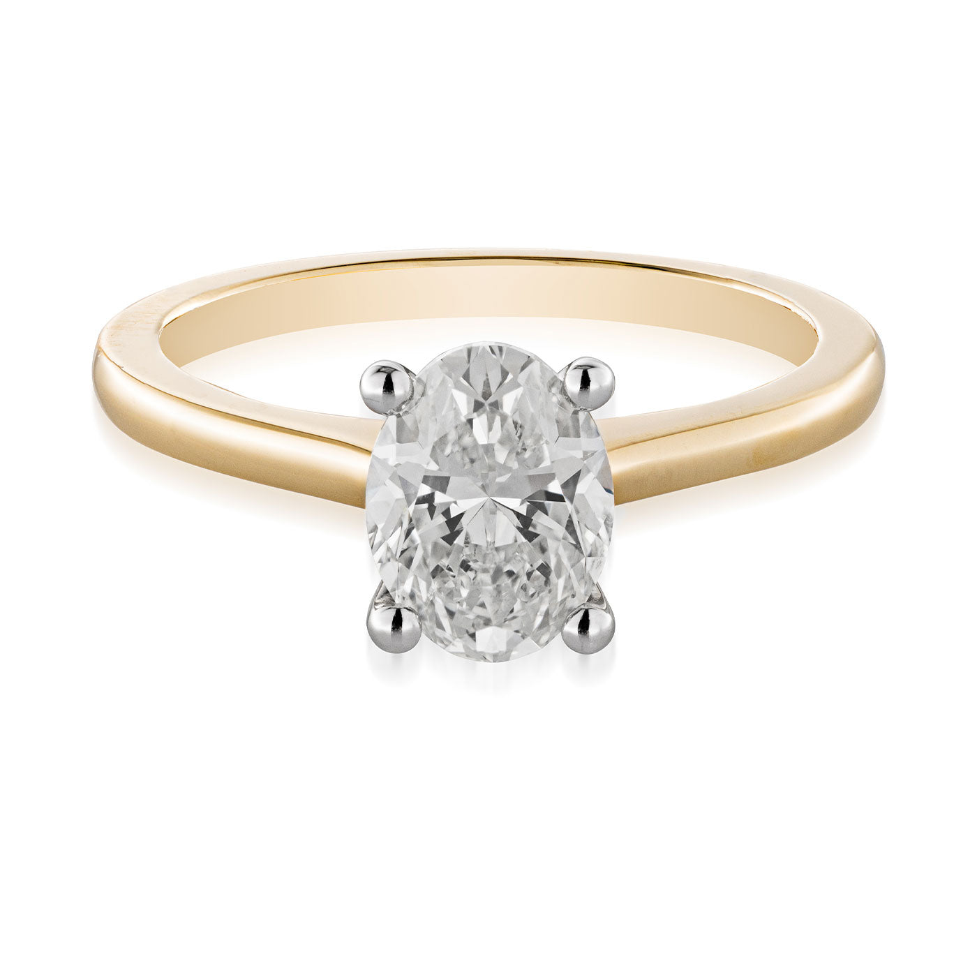 Introducing the Raffi&Co.® 14K Yellow Gold Oval Solitaire Diamond Engagement Ring: an elegant design featuring a stunning oval-cut diamond held securely by four prongs. The smooth, shiny 14K yellow gold band beautifully complements the sparkling diamond centerpiece, embodying timeless elegance.