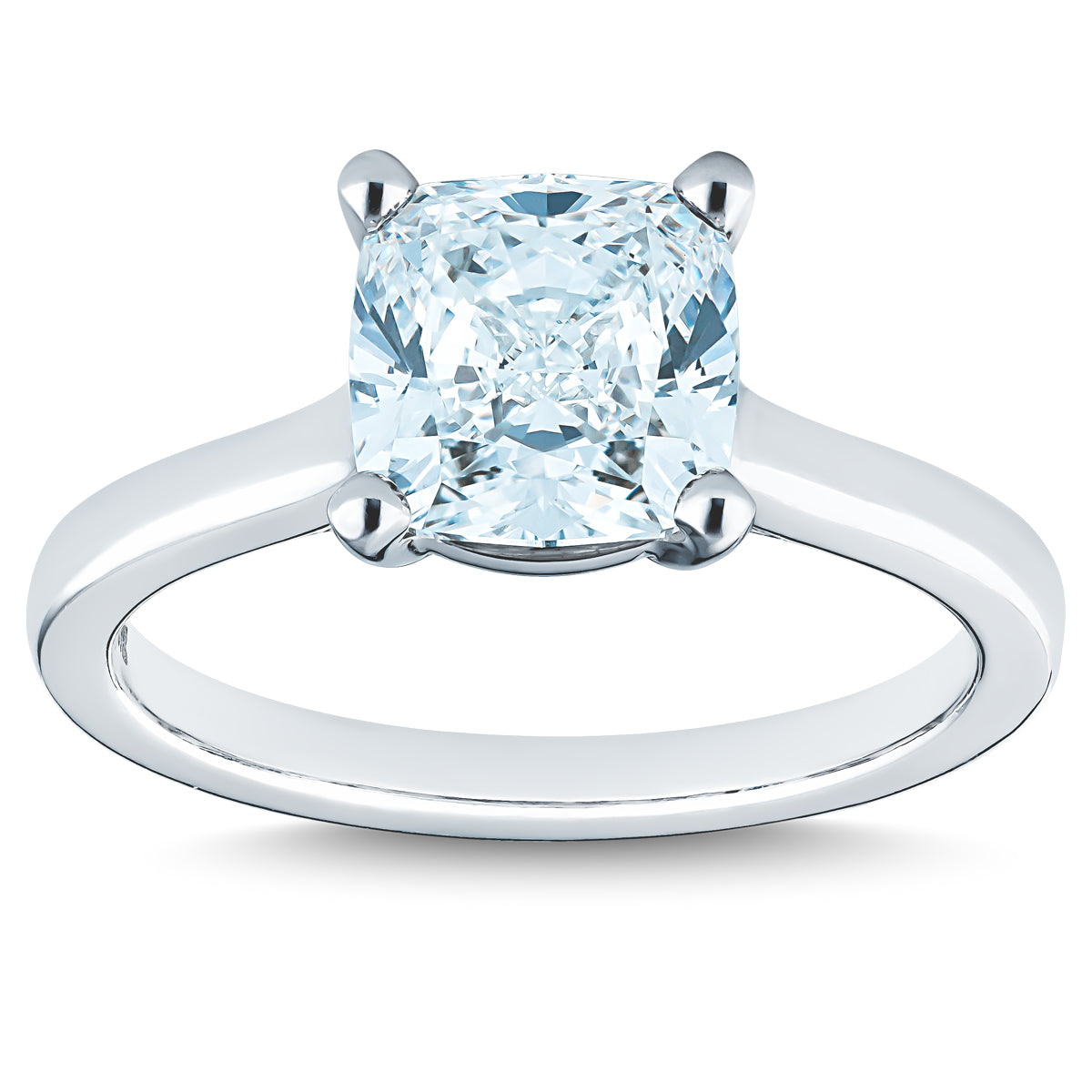 The Raffi&Co.® 14K White Gold Cushion Diamond Solitaire Engagement Ring showcases a prominent cushion-cut diamond secured with four prongs on a sleek and polished band, emphasizing the diamond's brilliance.