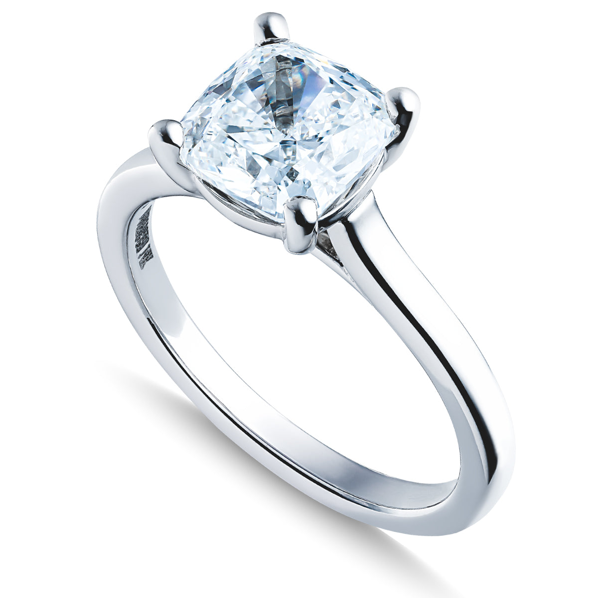 Introducing the Raffi&Co.® 14K White Gold Cushion Diamond Solitaire Engagement Ring, featuring a large cushion-cut diamond in a secure four-prong setting. The polished and smooth band enhances the brilliant sparkle of the diamond.