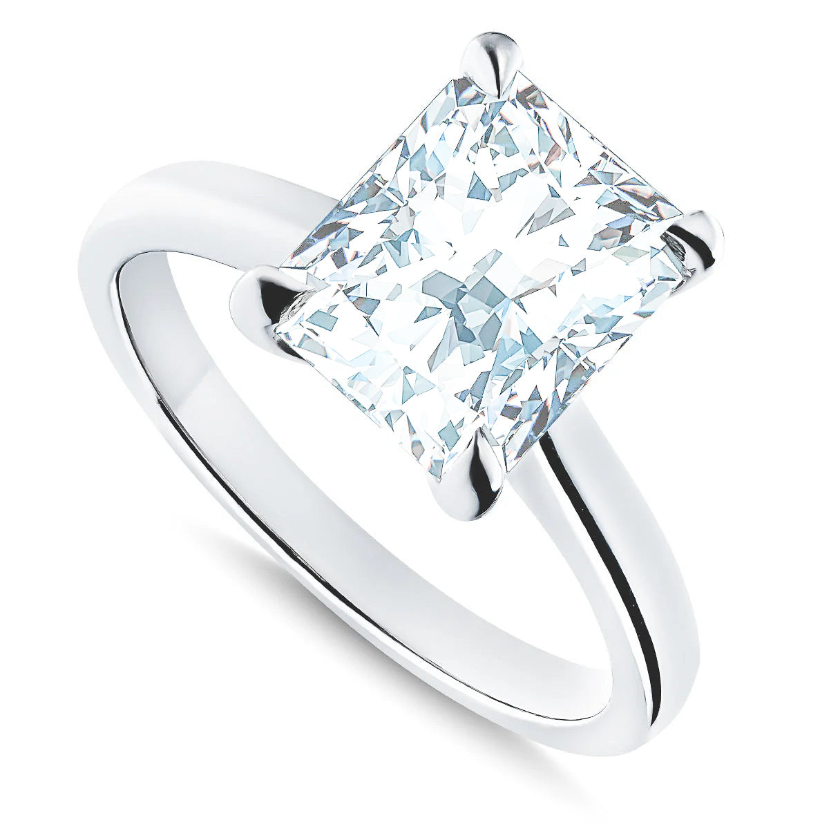 The Raffi&Co.® 14K White Gold Radiant Diamond Solitaire Engagement Ring features a large, square-cut diamond in a four-prong setting on a polished band.