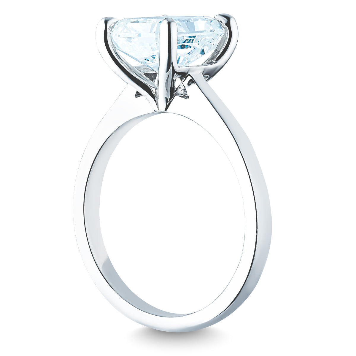 The Raffi&Co.® 14K White Gold Radiant Diamond Solitaire Engagement Ring features a radiant-cut diamond in a solitaire setting, displayed from a side angle. The sleek white gold band and prong setting accentuate the diamond's brilliance against a white background.