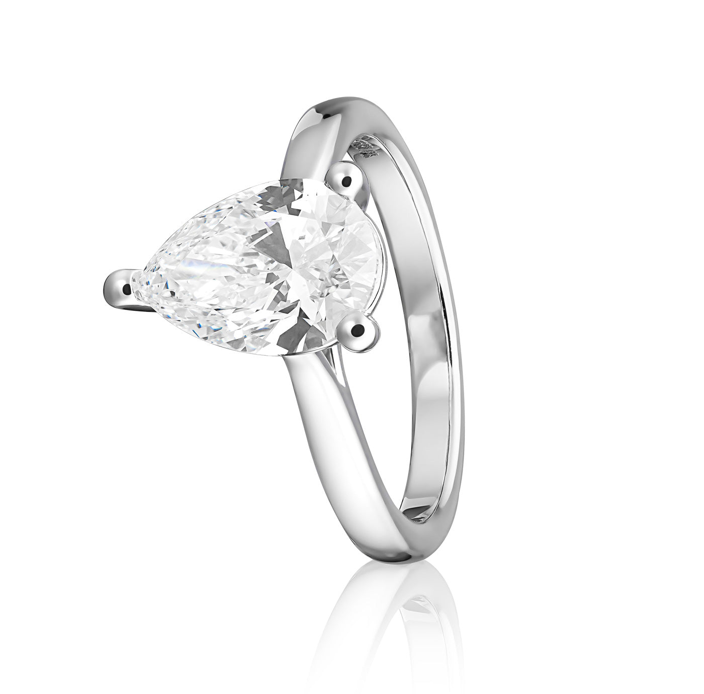 The Raffi&Co.® 14K White Gold Pear Solitaire Diamond Engagement Ring showcases a pear-shaped solitaire diamond elegantly set on a sleek 14K white gold band, beautifully presented against a pristine white background.